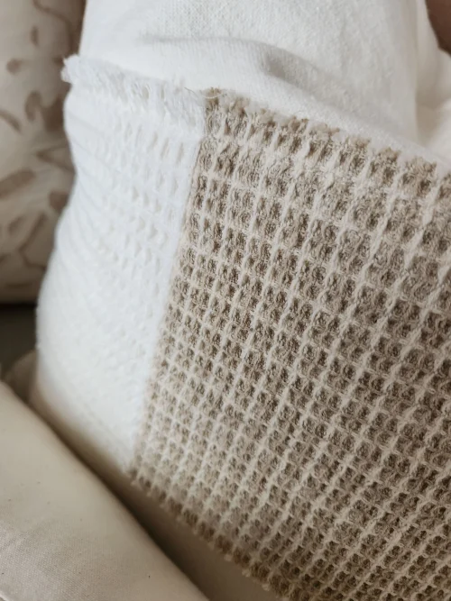 Off-white linen cushion